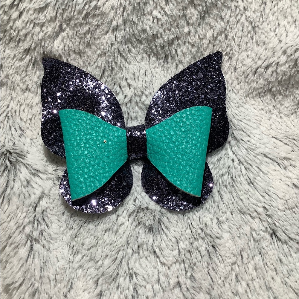 Dark blue and teal glittery butterfly hair bow clip